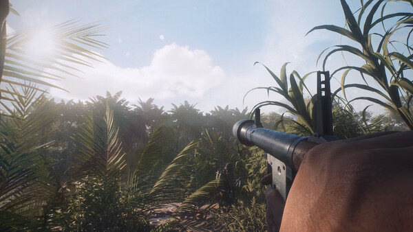 Screenshot from Hell Let Loose: Vietnam showing a player's perspective holding a gun in a dense jungle environment.