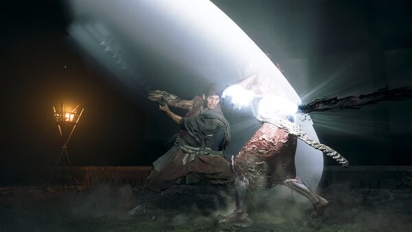 A screenshot from Onimusha: Way of the Sword showing a warrior battling a monstrous foe with a glowing sword in a dimly lit setting.