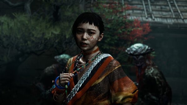 A screenshot from Onimusha: Way of the Sword showing a character in vibrant robes with a lush, eerie forest backdrop.