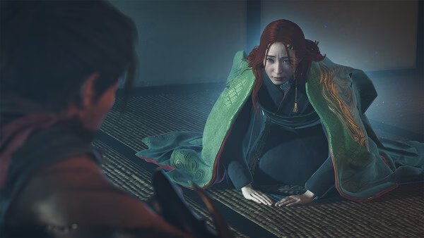 Screenshot from Onimusha: Way of the Sword showing a character in a green cloak kneeling on a tatami mat.