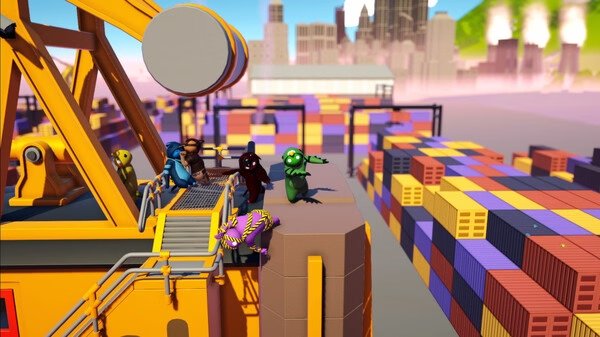 Gang Beasts screenshot: Colorful characters battle precariously on a crane above stacks of shipping containers.