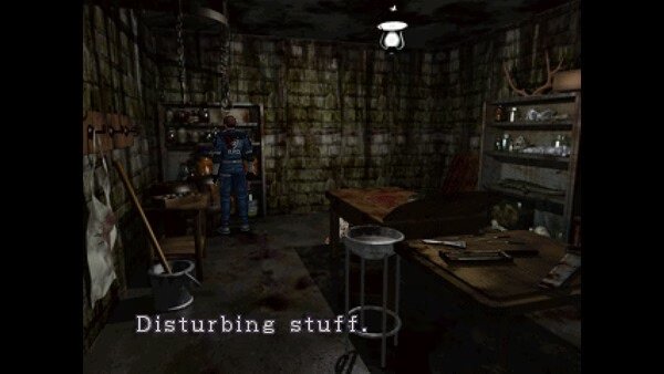 Resident Evil 2 (1998) screenshot: A character in a dim, cluttered room with a message "Disturbing stuff" on the screen.