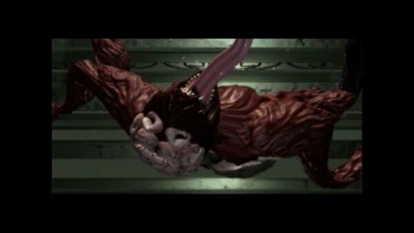 Screenshot from Resident Evil 2 (1998) showing a mutated creature with exposed muscles and sharp claws in a dimly lit environment.