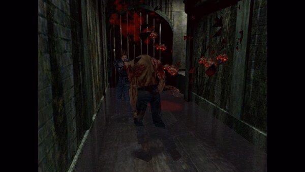 Resident Evil 2 (1998) screenshot: A player character faces a zombie in a dim, narrow hallway, with shattered debris suspended in midair.