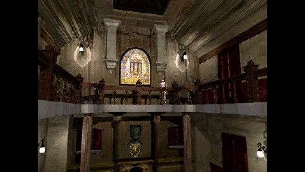 Screenshot of Resident Evil (1996) showing a character on a balcony in a dimly lit mansion interior.