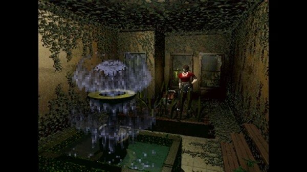 Resident Evil (1996) screenshot: Character stands near a water fountain in a dimly lit, overgrown room.