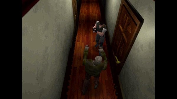 A screenshot from Resident Evil (1996) showing a character in a hallway aiming a weapon at an approaching zombie.