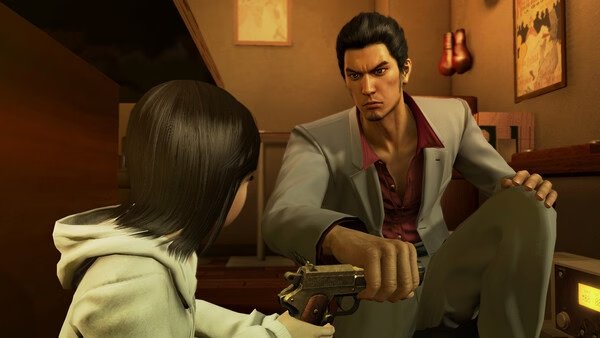 Yakuza Kiwami screenshot: A tense scene showing a man in a suit handing a revolver to a young girl in a hoodie indoors.