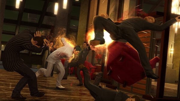 Screenshot from Yakuza Kiwami showing a dynamic fight scene in a bar, with characters engaged in intense combat.