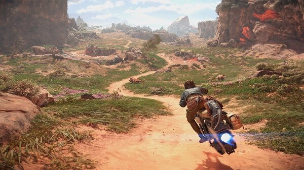 A screenshot from Star Wars Outlaws showing a character riding a speeder bike through a scenic, rocky desert landscape.