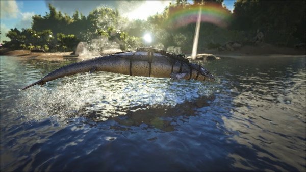 Screenshot from ARK: Survival Evolved showing a fish-like creature jumping over water with a rainbow in the background.