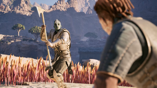 Avowed screenshot: A warrior with an axe confronts another character in a desert landscape with rocky cliffs and sparse trees.