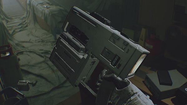 ROUTINE screenshot: A hand in a spacesuit holding a large, futuristic device amidst a cluttered, dimly lit room.
