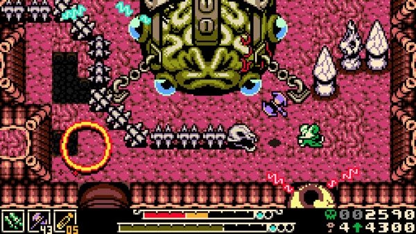 Screenshot from 'Mina the Hollower': Mina battles a large green creature surrounded by spikes in a pixelated dungeon setting.