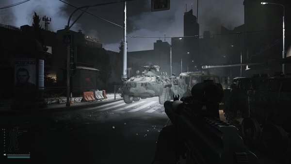 Escape from Tarkov screenshot: A player aims at armored vehicles on a dark, urban street illuminated by streetlights.
