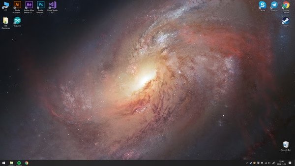 A Wallpaper Engine screenshot showing a galaxy-themed desktop background with various application icons on the top left corner.