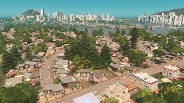 A screenshot from Cities: Skylines showing a sprawling suburban neighborhood with winding roads and distant city skyline.