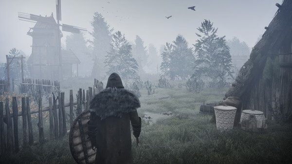 Bellwright screenshot: A hooded figure with a shield stands in a foggy village, near wooden fences and a windmill in the distance.
