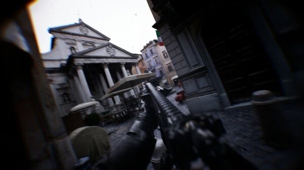 Screenshot from the game Bodycam shows a first-person view aiming a rifle down a cobblestone street with historic buildings in the background.