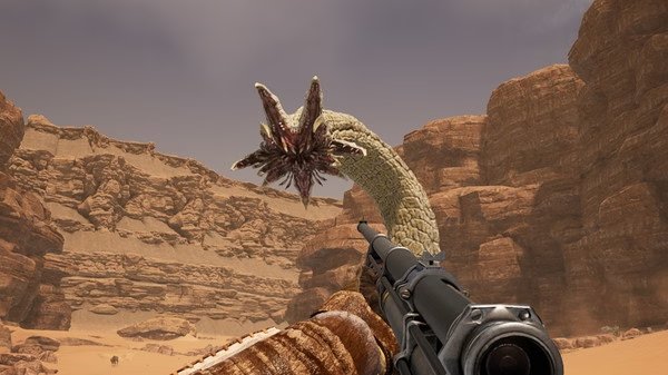 A screenshot from ICARUS showing a player aiming at a large sandworm in a desert canyon environment.