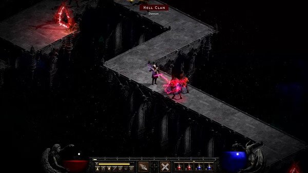 A Diablo II: Resurrected screenshot shows a character battling a Hell Clan demon on a dark, narrow stone bridge.