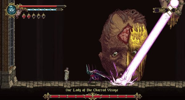 Blasphemous screenshot: A player battles Our Lady of the Charred Visage, a giant face emitting a glowing beam.