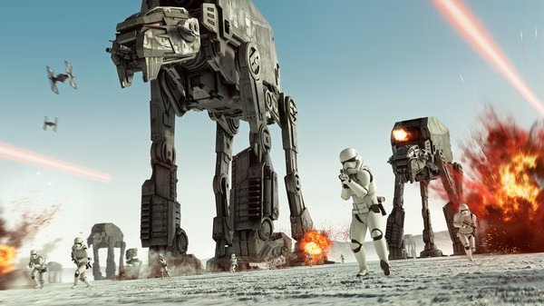 STAR WARS Battlefront II screenshot: Stormtroopers and AT-ATs advancing amid explosions and laser fire on a snowy battlefield.