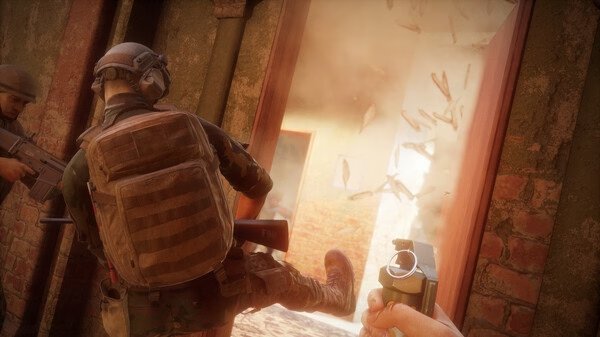 Insurgency: Sandstorm screenshot showing a soldier kicking a door while another holds a grenade, amidst flying debris.