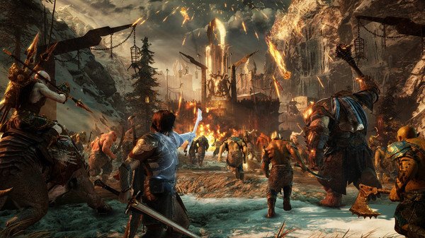 Screenshot from Middle-earth: Shadow of War showing a hero leading an army charge towards a burning fortress amid a snowy landscape.
