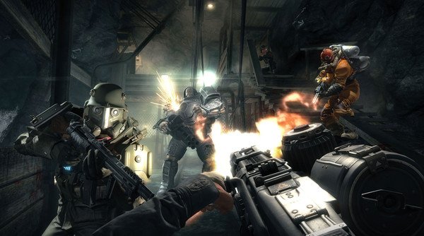 Wolfenstein: The Old Blood screenshot of intense gunfight in a dark tunnel, with soldiers in combat gear exchanging fire.