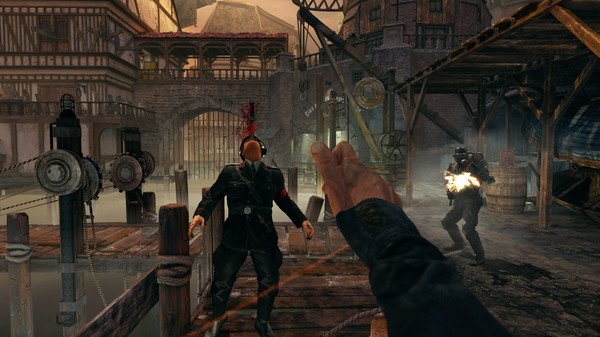 Screenshot from Wolfenstein: The Old Blood showing a player attacking a soldier with a melee weapon on a dock.