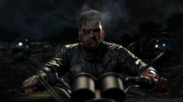 Screenshot of Metal Gear Solid V: The Phantom Pain showing a character in a leather jacket riding a motorcycle at night.