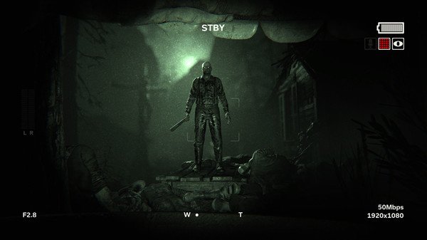 Outlast 2 screenshot: A menacing figure with a weapon stands among fallen bodies in a dark, eerie setting.