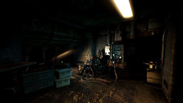 SOMA screenshot: A dimly lit, cluttered room with a tangled machine and glowing screens, creating an eerie, sci-fi atmosphere.