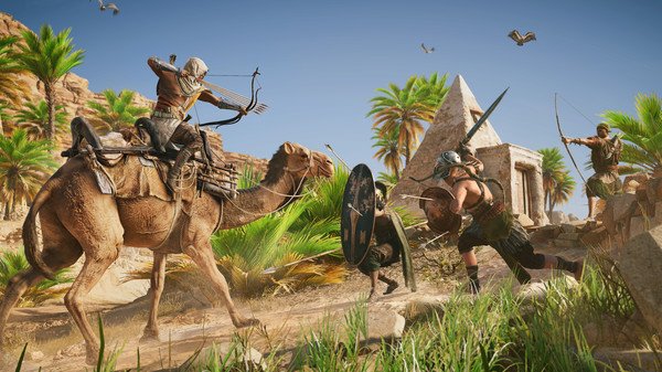 Screenshot from Assassin's Creed Origins: A character on a camel aims a bow at shield-wielding soldiers in a desert setting.