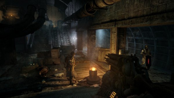 A Metro 2033 Redux screenshot showing a dimly lit underground tunnel with armed characters near a fire barrel.