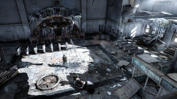 Screenshot from Metro 2033 Redux showing a dilapidated, icy hall with scattered debris and a lone figure in the center.