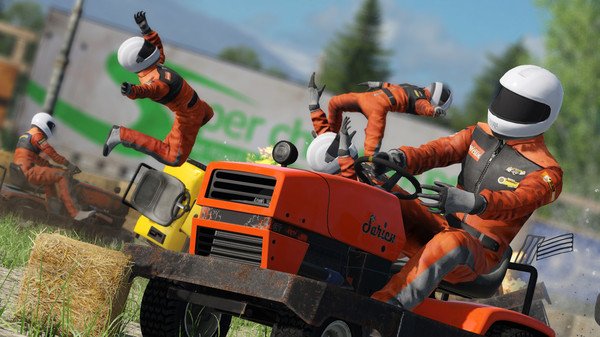 Wreckfest screenshot: Players in racing suits fly off ride-on lawnmowers during a chaotic race, with hay bales scattered around.