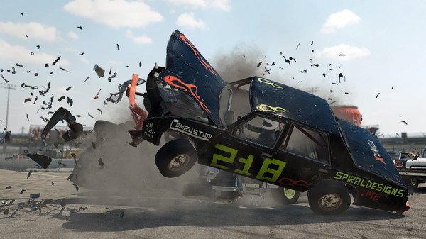 Wreckfest screenshot: Two cars collide mid-air, debris flying as destruction unfolds on a racetrack under a clear sky.
