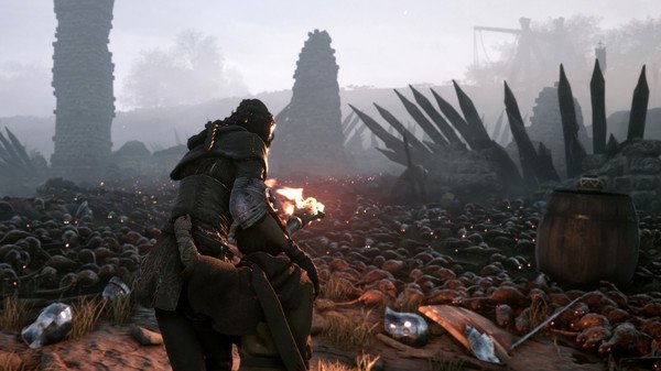 Screenshot from A Plague Tale: Innocence shows a character with a torch navigating a field of debris and rats amid ruins.