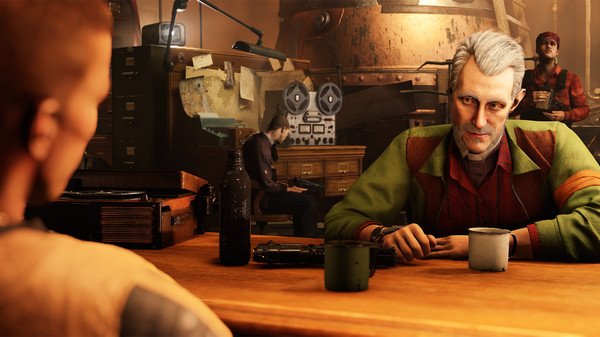 Screenshot from Wolfenstein II: The New Colossus showing characters sitting at a table in a detailed, industrial interior setting.