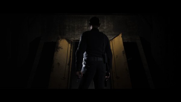 Screenshot from The Quarry showing a lone character standing in a dark room, facing an open door with dim lighting.