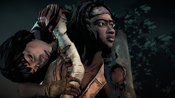 Screenshot from The Walking Dead: The Telltale Definitive Series showing a character carrying a wounded person through a dark forest.