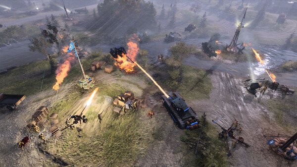 Screenshot from Company of Heroes 3 showing a tank firing at enemy forces amidst a battlefield with explosions and scattered debris.