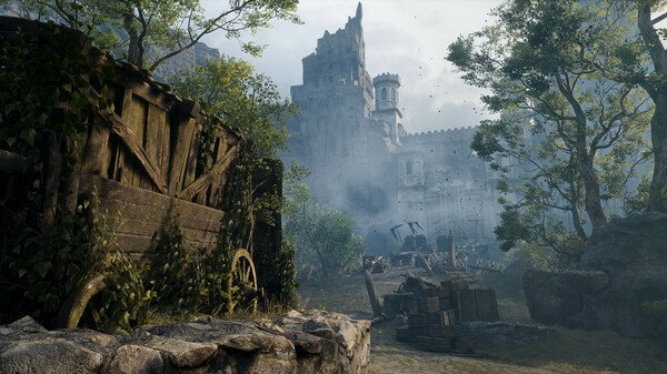 Screenshot from Witchfire showing a misty, abandoned castle surrounded by trees and old wooden carts.