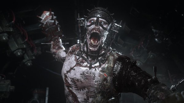 A screenshot from Call of Duty: WWII showing a grotesque zombie-like figure in tattered clothes and a metal headpiece lunging forward.