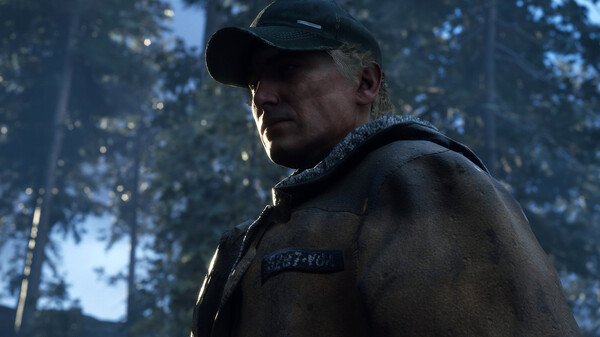 Screenshot from 'Hell is Us' showing a figure in a cap and jacket standing in a forest, with sunlight filtering through the trees.