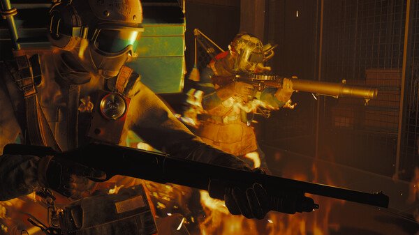 FBC: Firebreak screenshot showing two armored characters with weapons, surrounded by flames in an intense action scene.