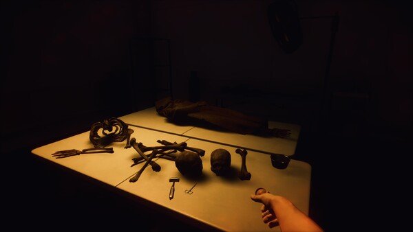 A screenshot from KeepUp Survival showing a dimly lit table with scattered bones, tools, and a wrapped body, a hand reaching out.